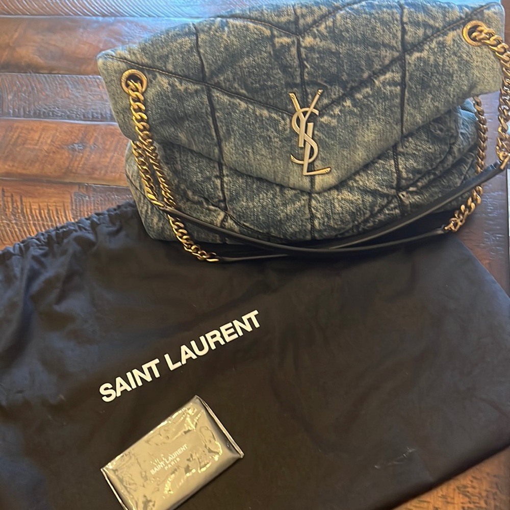 Beautiful Denim YSL handbag. Only had for 6 months. Used for photo shoot.